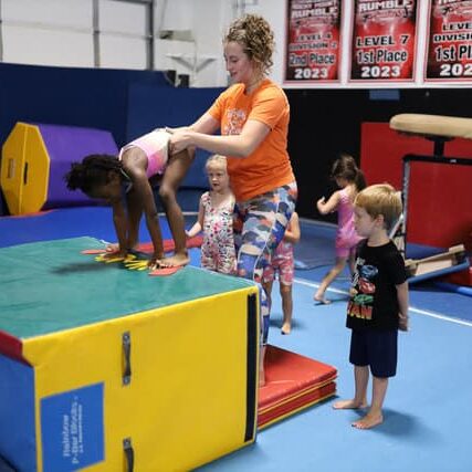 Rachel Meyer with preschool gymnasts