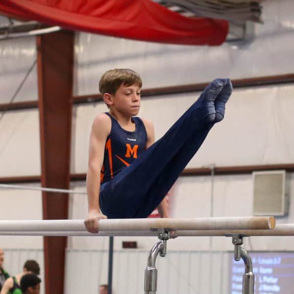 Gymnast on parallel bars
