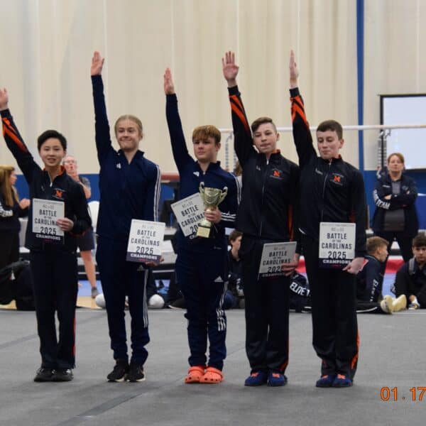 Competitive gymnast posing