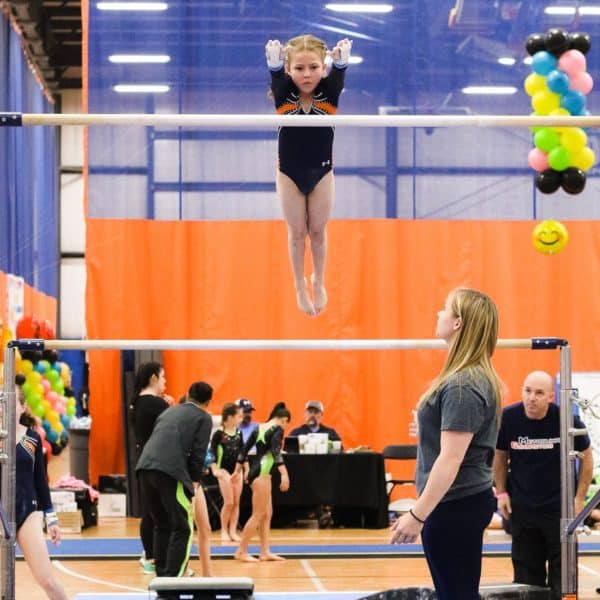 Young gymnast on beam